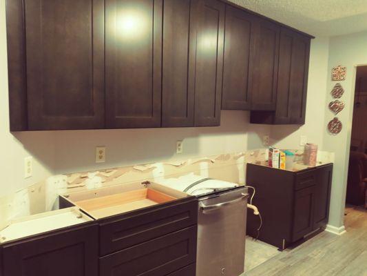 Custom cabinetry- angles walls at either end of the kitchen