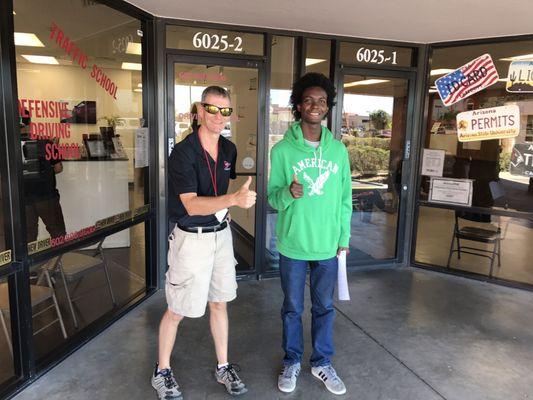 Instructor Paul with Kierre. Kierre got his license today.