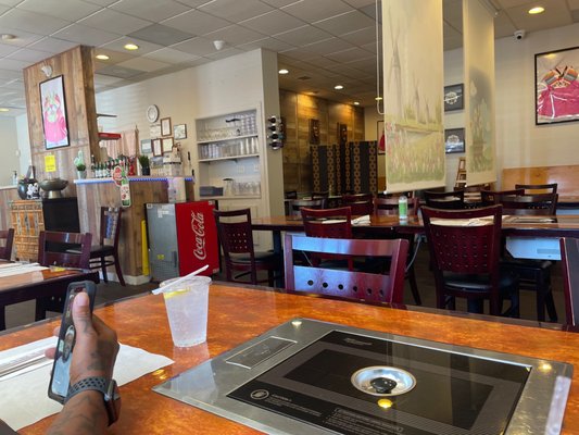 Sitting in the very corner of the restaurant , this is the view of the entire restaurant .