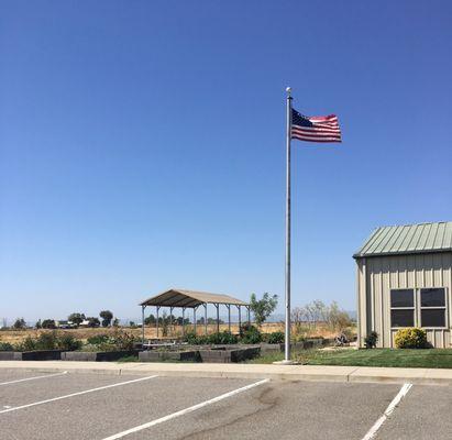 American Flag right next to Colusa Business Visitor Center office