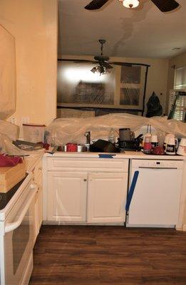 kitchen sink showing plastic sheeting