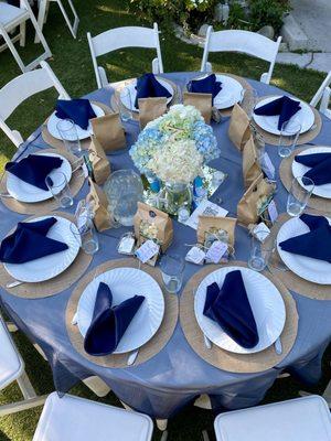 Place settings are your choice of colored linen, plates, glasses, and silverware. You provide the decor.