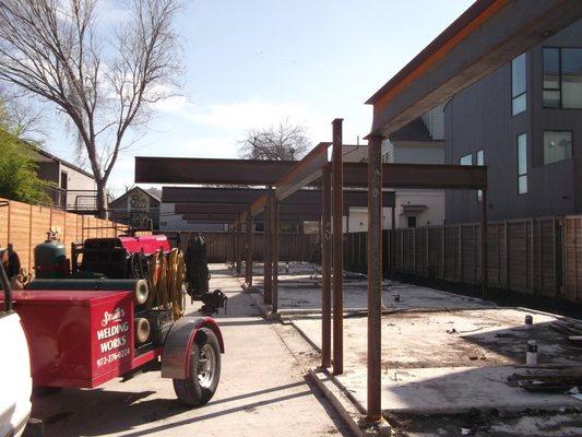 Erected, tac welded beams for local home builder.