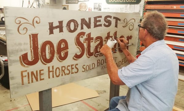 Hand painted signage aged to perfection