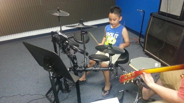 A future drummer in the making.