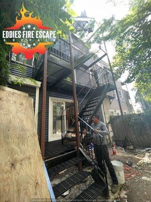 Fire Escape custom fabricated , in this picture you can see that we were already installing the last handrails