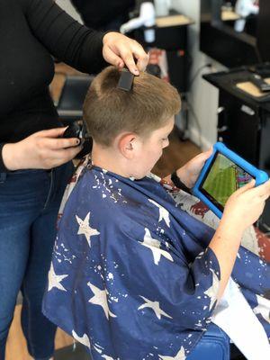 Making your kids haircuts just a little easier. iPad me toys for the win!