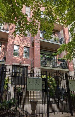 Black iron fence and balconies, sanded primed and painted.