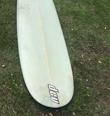 Customer brought in board with a couple of nasty gashes. Filled, painted to match original color, glass and sanded. Ready to hit the water!