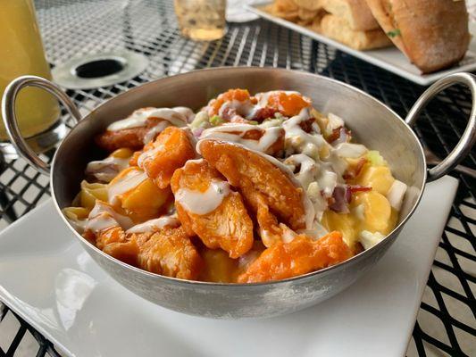 Buffalo Chicken Mac and Cheese bowl with bleu cheese crumbles and bacon bits.