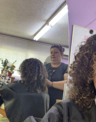 Ana cutting my wild curly hair