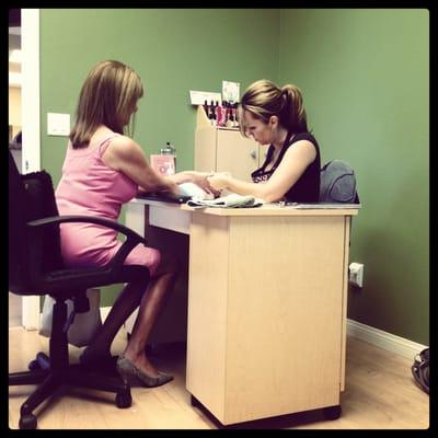 Manicurist Lynnette working her magic.