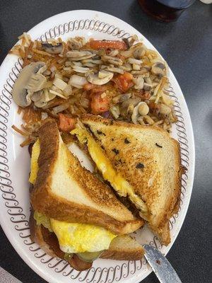 Texas sausage egg and cheese with hash browns