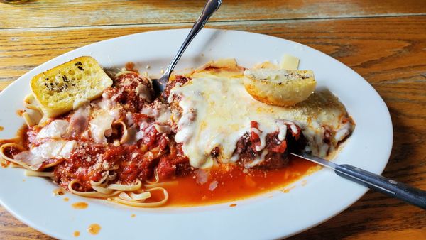 Veal parm over linguini