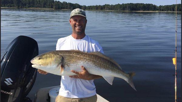 Big Bull Redfish after stocking up at Intracoastal Anglers on popping corks and DOA paddle tails.