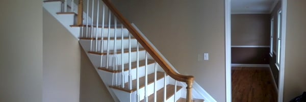 Huntington, NY. Entrance private home. Detail painting and staircase.