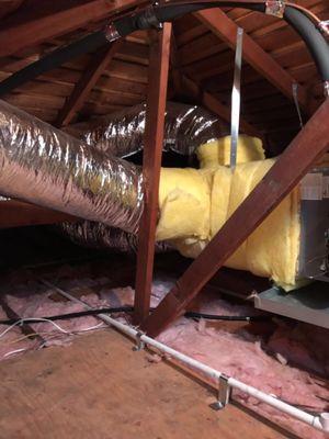 Old attic insulation cleaned out and installation of new R30 batts insulation