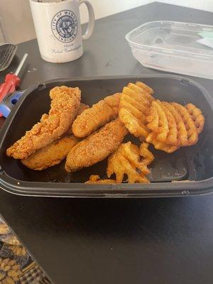 Chicken Tenders and waffle fries