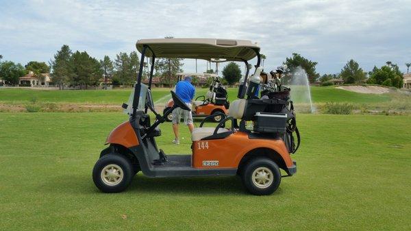 A Golf and Grow player takes aim at the green for their approach shot at Camelback Ambiente course