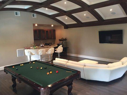 Game Room Entertainment -75" Smart Tv, Wall mounted subwoofer, in-ceilling speakers, Control 4 Smart Controller