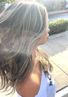 Full highlights with long layered haircut.