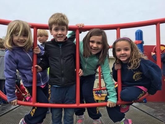 Students playing on our brand new playground.