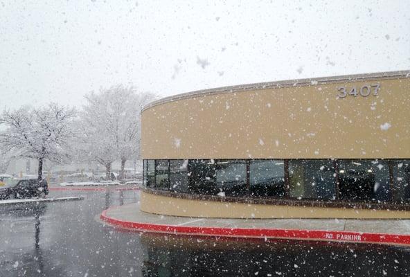 Exterior of the newly constructed addition (opened early 2016) at the Juan Tabo Library, on a snowy day.