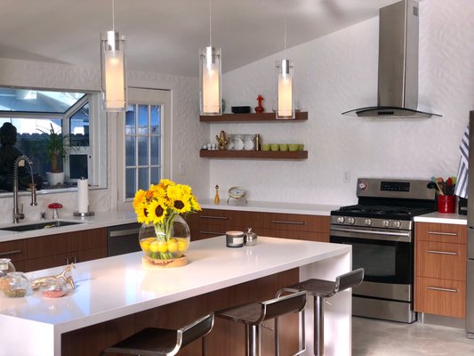 Beautiful backsplash, 36x12 textured porcelain tiles with enhanced stain resistant 1/16'' bright white grout.