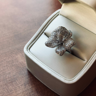 Introducing our exquisite Pave Diamond Flower Ring in luminous white gold - a true masterpiece designed for those cherished special events.