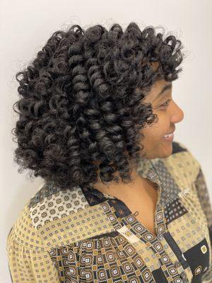 Rod set on extremely thick ,  14 inch long hair, curly natural hair.