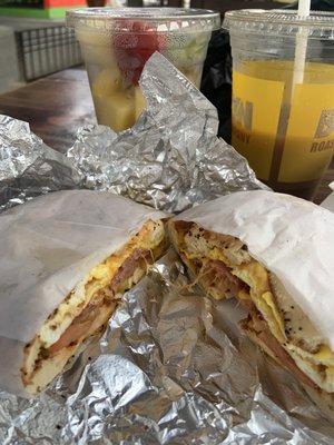 Some fruit and a turkey bacon, egg, cheddar, tomato on a scooped out everything bagel - he made the effort to actually scoop it out well