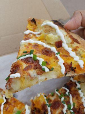 Close up shot of baked potato pizza