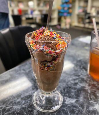 Chocolate ice cream with rainbow sprinkles; what a yummy treat!