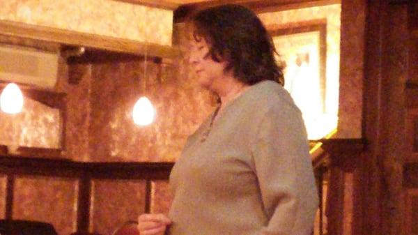 Kristina Bloom receiving and giving spirit messages at Haunted Brumder Mansion, Milwaukee. Gallery Readings.