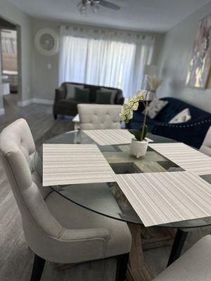 Beautiful seating area!  (All glass gets wiped and place mats get put out and present it for the guests that are checking in today!