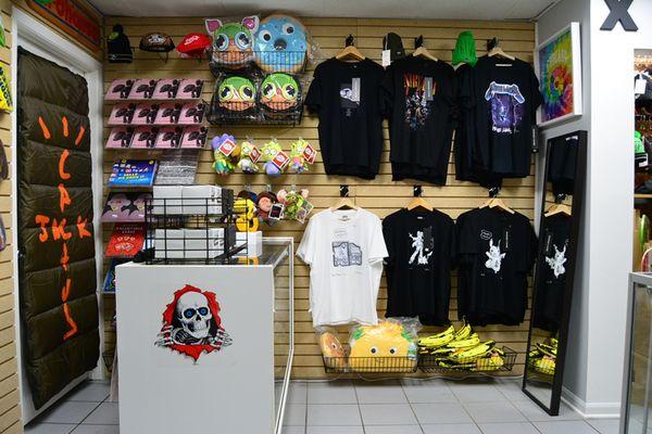 Daniel Arsham x Pokémon T-shirts, Travis Scott sleeping bag, Kidrobot collectibles, KAWS books, Hebru Brantley Pillows.