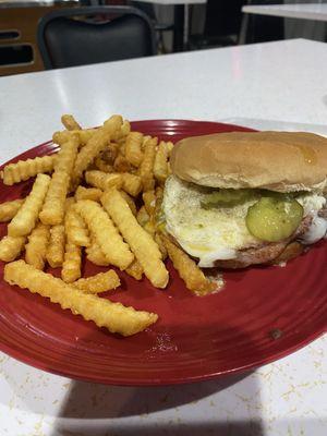 Cowtown burger, burger with ham and cheese and added an egg.  Served with fries