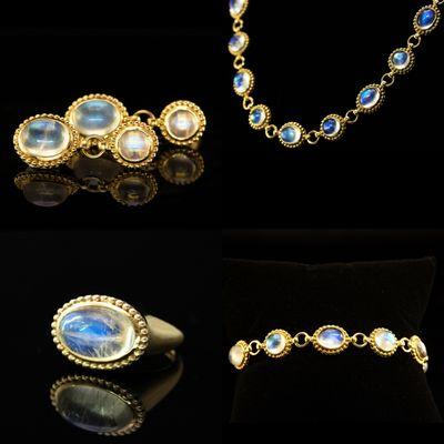 Jeffrey Burroughs 
83cts rainbow moonstone set, with 14k yellow gold setting pieces.