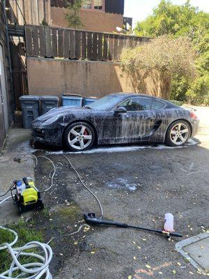 We come to you! Foam bath pre wash, followed by a 2 bucket hand wash. Step 1 of many for our wash process