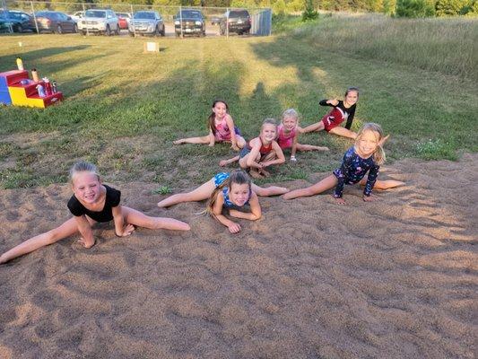 They have a HUGE sand pit and Trampoline outside for their gymnasts!