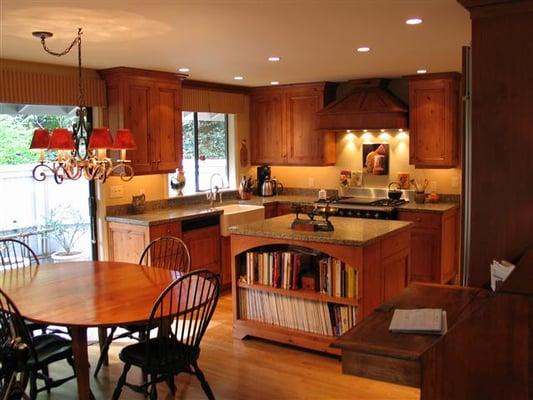 Traditional knotty alder cabinets, new lighting, granite counter and window treatments. See Hertco cabinets in our showroom.