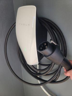 New Tesla Universal charger with both J1772 and Tesla charging plug so you can charge any electric car