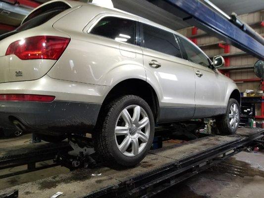 Customers' Audi being aligned on our state of the art alignment machine.