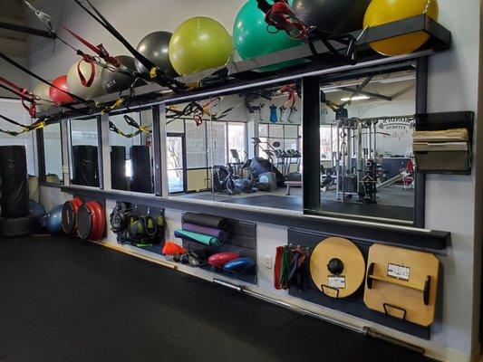 2021 Adapting to the times! Mirrors that slide back to a full wall of mirrors for TRX & Kick Box classes! A must for form & Technique!