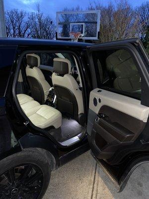 A photo of the interior of a Range Rover after a detail.