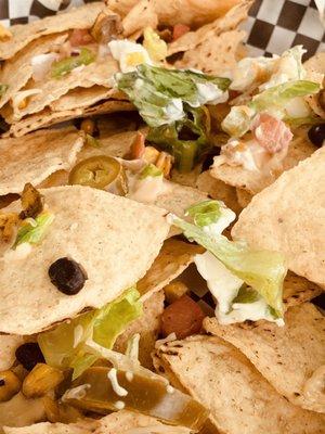 Stale Tortilla Chips in Nachos, VERY LITTLE CHEESE, NO SALSA, WILTED LETTUCE...#AWFUL