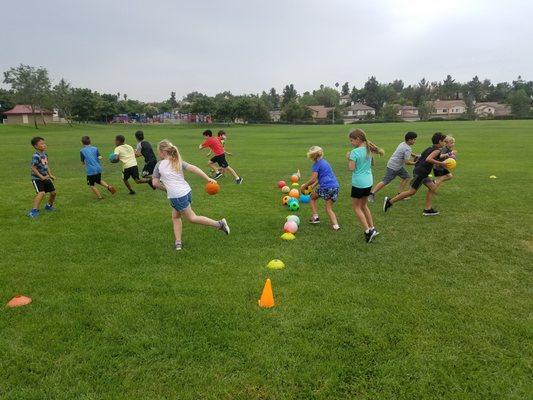 Students love EMH Sports! Look how much fun they are having playing our most popular sport, Nerf Dodgeball.