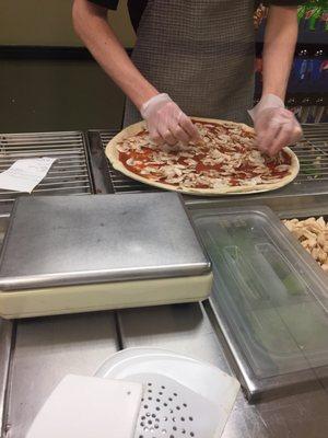 Pizzas in the making