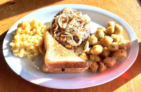 The Horn dinner plate with macaroni and cheese and fried okra.