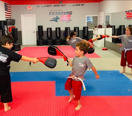 Our core program students are focused and fierce, showing impressive determination with every punch and kick. It's incredible to see.